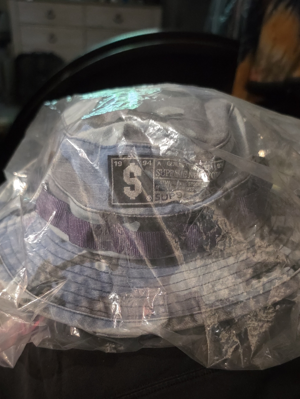 Supreme light blue denim bucket hat with purple ribbon